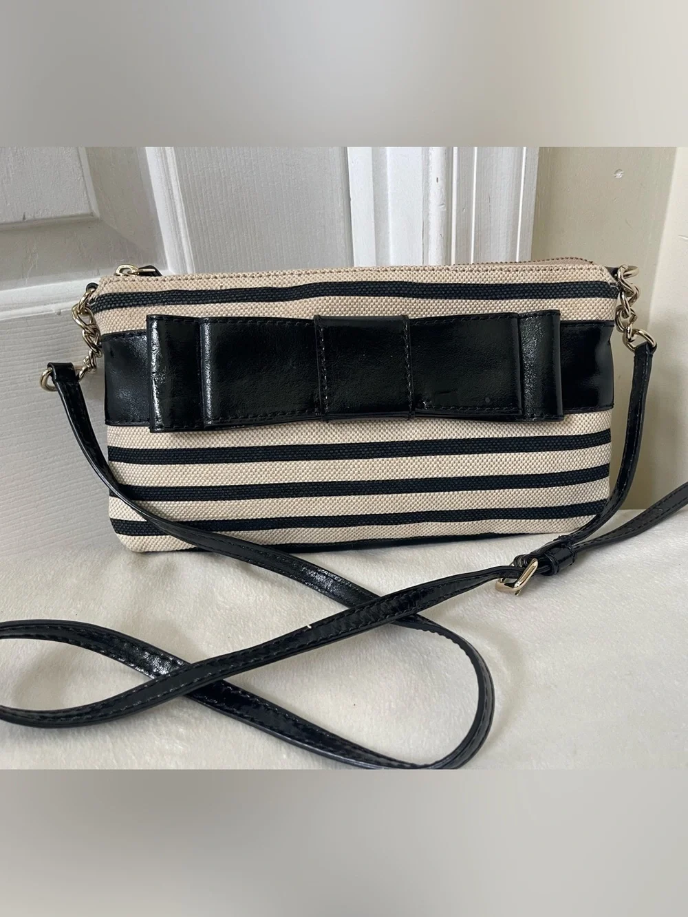 kate spade Black and Cream Striped Crossbody with Bow Detail